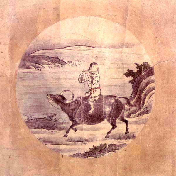 Ink painting in a circular frame of a small figure seated sideways on the back of a walking ox, playing a flute, with a riverbank and sparse trees behind.