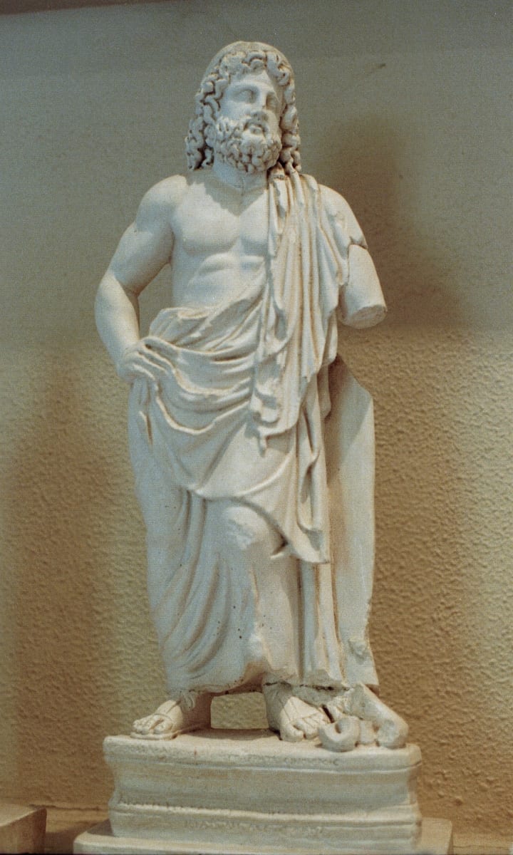 Marble statue of a bearded Asclepius at the Archaeological Museum of Epidaurus.