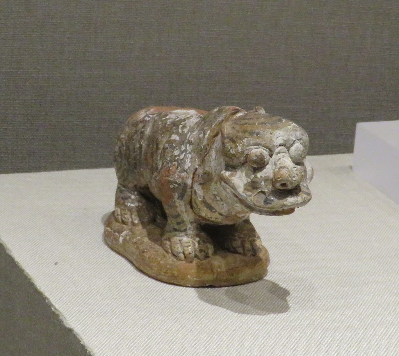 Chinese porcelain tile showing the White Tiger (Bái Hǔ) of the West, one of the four directional guardian beasts in Chinese cosmology, Qing dynasty late 18th century, Metropolitan Museum of Art.