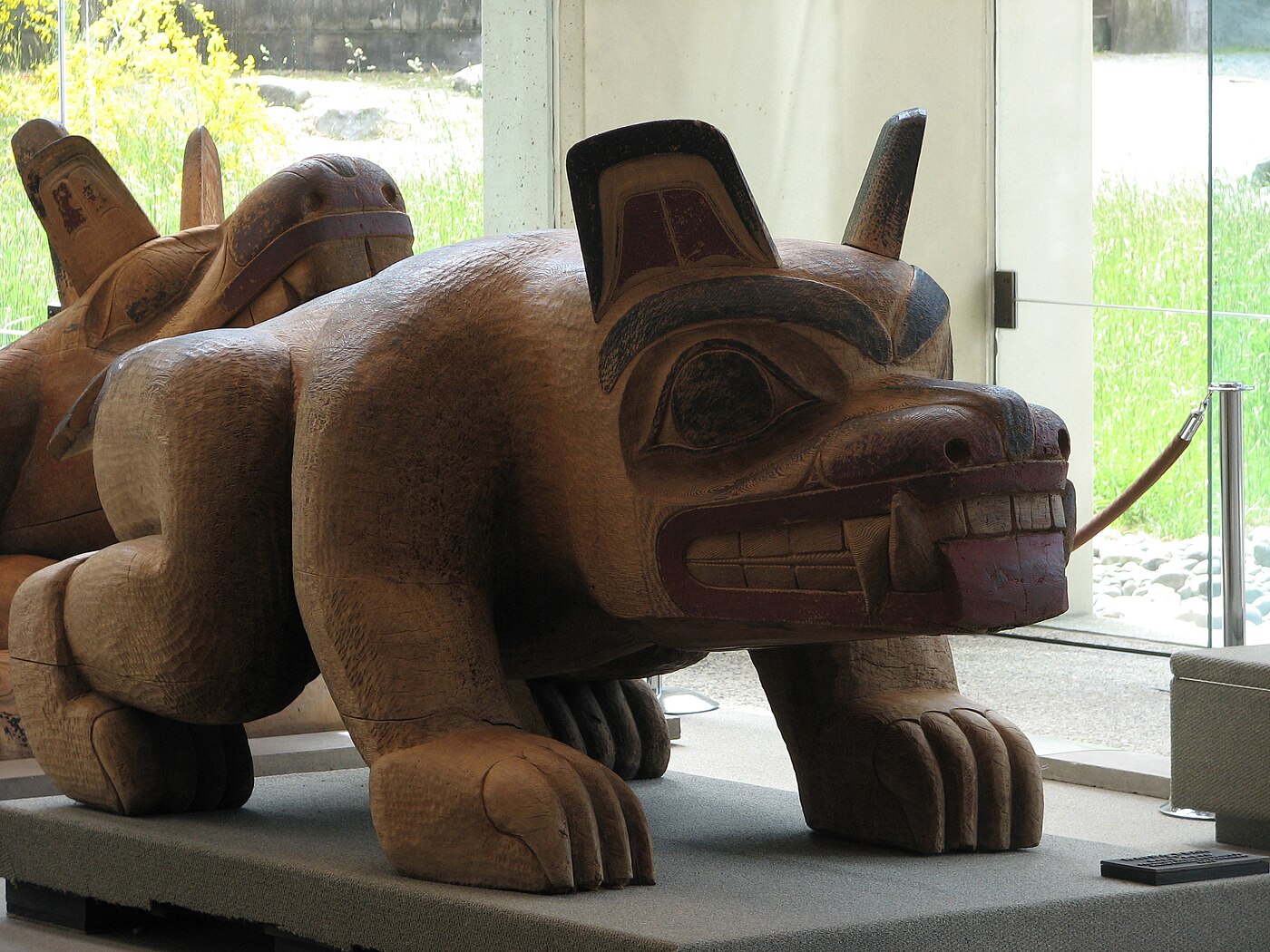 Bill Reid's Haida Bear carving at the Museum of Anthropology, University of British Columbia, with Sea Wolf visible in the background.
