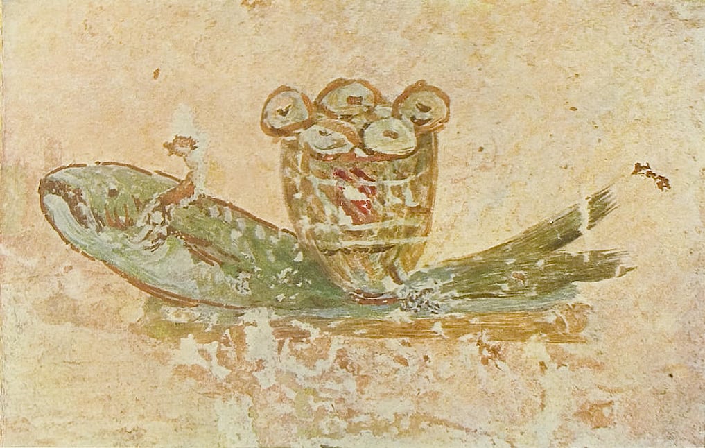 Early Christian ichthys (fish) symbol carved on a marble slab from the Catacombs of Priscilla, Rome, 2nd–3rd century CE, showing two fish in the distinctive pointed-oval form that became the symbol of Christianity.