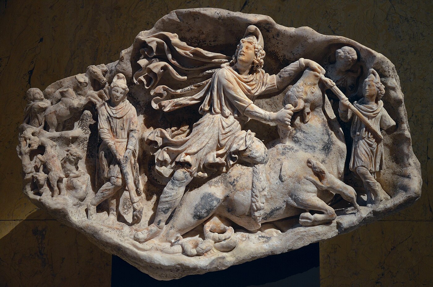 White marble tauroctony relief showing Mithras killing the bull in a grotto, CIMRM 736, Kunsthistorisches Museum Vienna, 2nd century CE.
