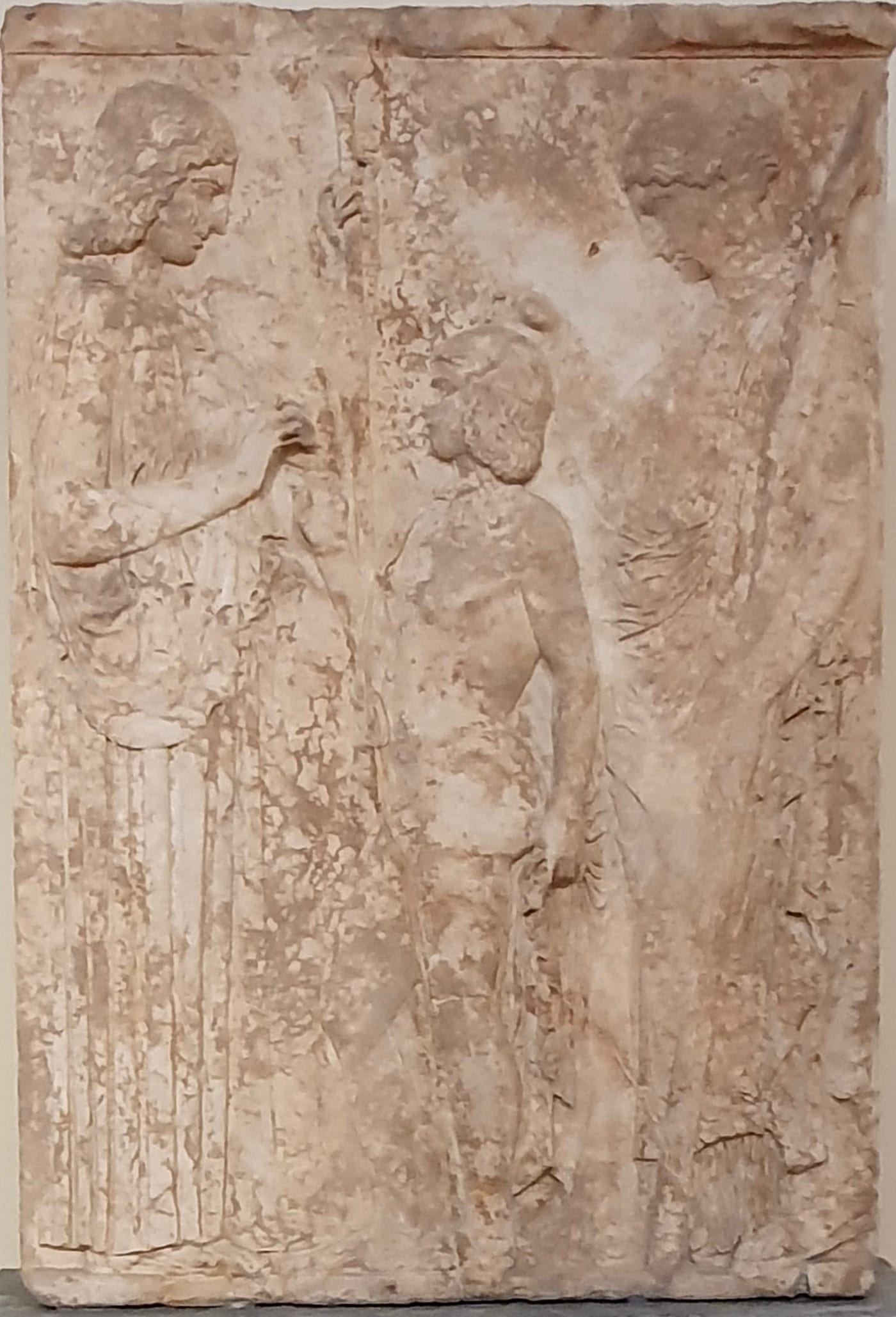 Marble votive relief from Eleusis showing Demeter presenting a sheaf of grain to Triptolemos while Persephone looks on, c. 440 BCE, National Archaeological Museum Athens.